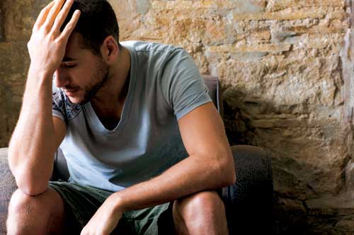 Depressed dad suffering from paternal postnatal depression (PPND)