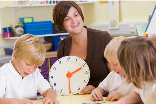 Children learning to tell time