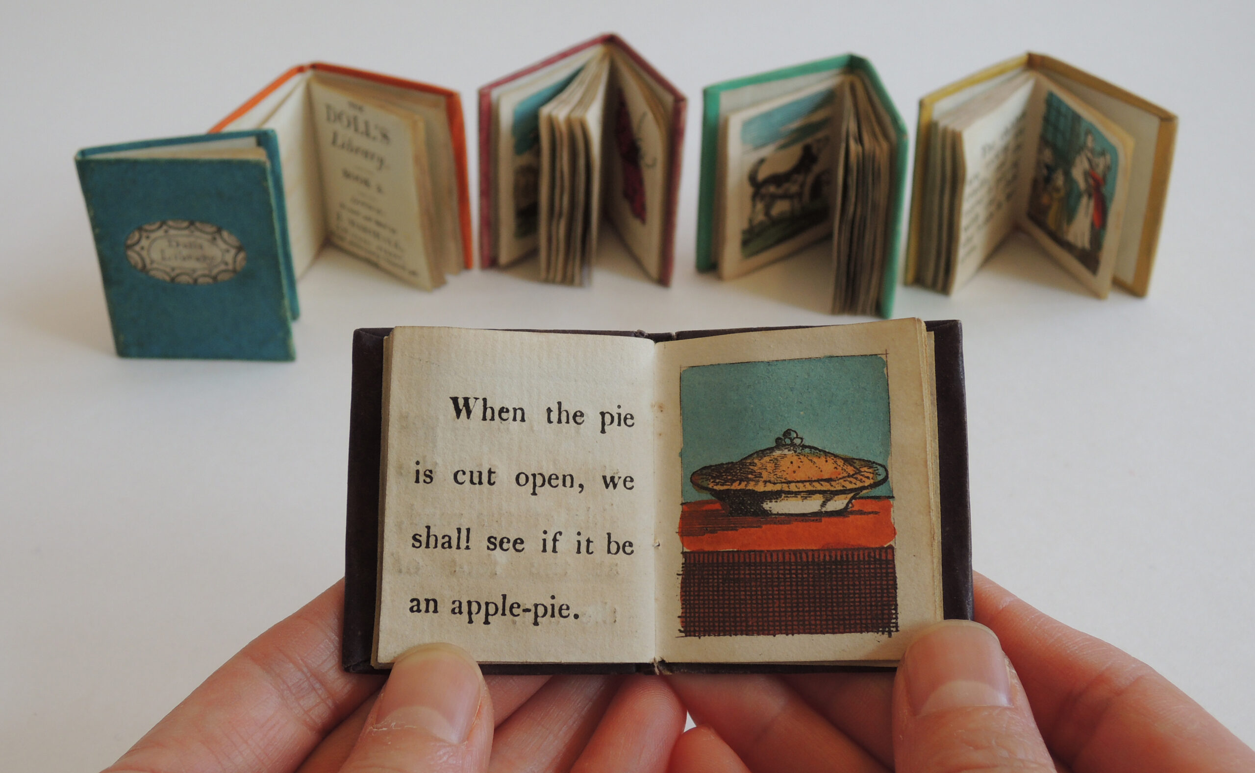 Miniature Worlds: An Artistic Collaboration of Tiny Libraries - NJ Family